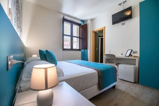 Deluxe Tek Büyük veya İki Ayrı Yataklı Oda