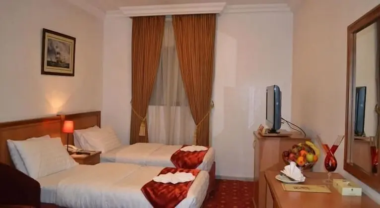 Üç Kişilik Oda