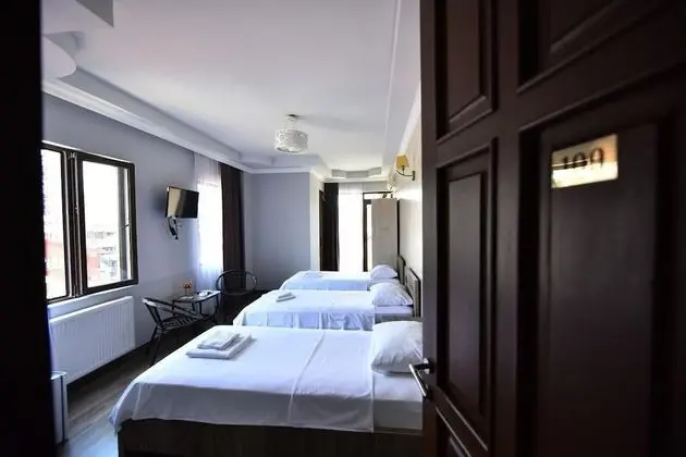 Üç Kişilik Oda