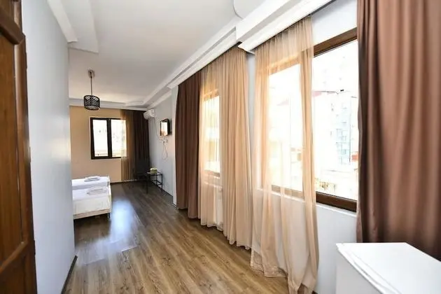 Üç Kişilik Oda
