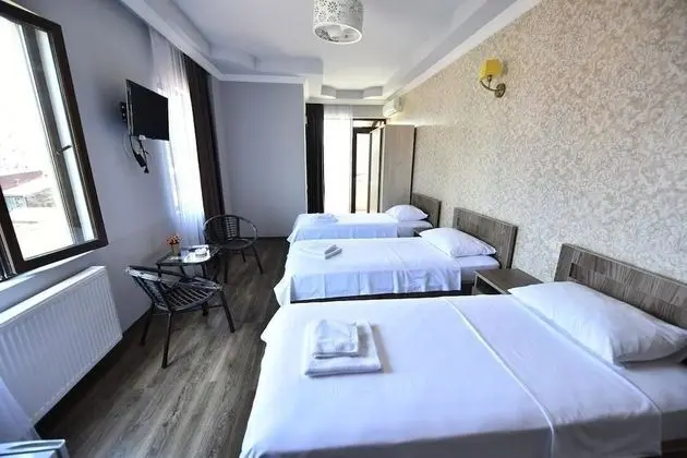 Üç Kişilik Oda