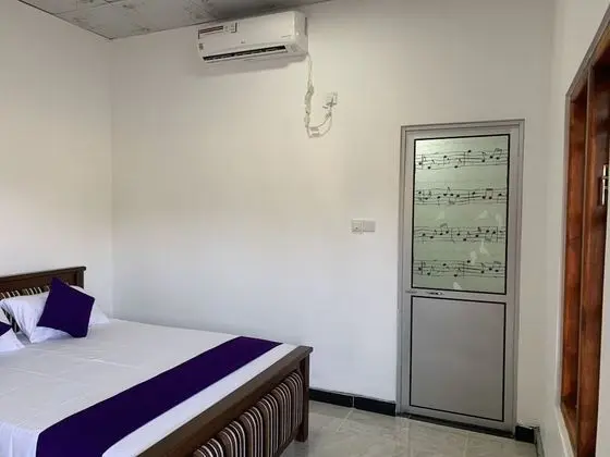 Deluxe Tek Büyük Yataklı Oda, Bahçe Manzaralı, Plaj Kenarı