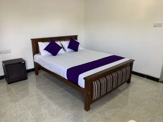Deluxe Tek Büyük Yataklı Oda, Bahçe Manzaralı, Plaj Kenarı