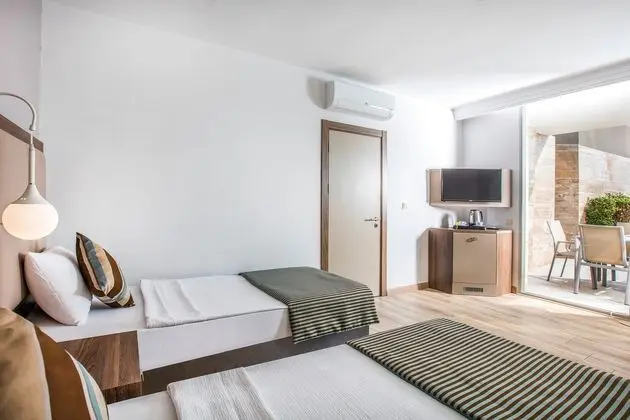 https://imagessl.etstur.com/files/images/hotelImages/TR/55721/l/Palm-Wings-Ephesus-Beach-Resort-Oda-97457.jpg