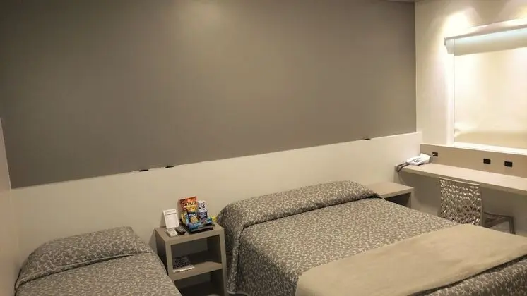 Quarto Triplo Standard -  3 Camas de Solteiro Ou 1 Cama de Casal e 1 Cama de Solteiro