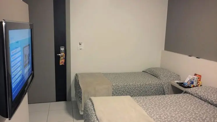 Quarto Triplo Standard -  3 Camas de Solteiro Ou 1 Cama de Casal e 1 Cama de Solteiro