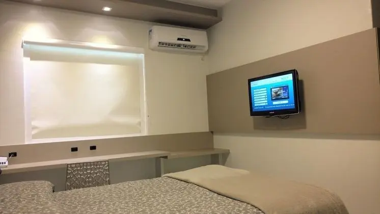 Quarto Triplo Standard -  3 Camas de Solteiro Ou 1 Cama de Casal e 1 Cama de Solteiro