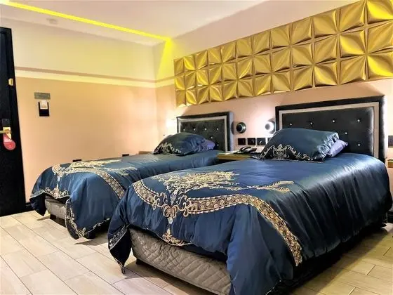 Economy Tek Büyük veya İki Ayrı Yataklı Oda