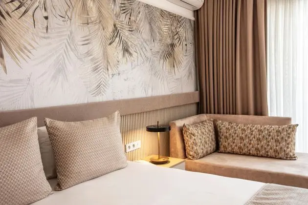https://images.etstur.com/imgproxy/resize/2560x1440/files/images/hotelImages/etsrooms/912/Palmin_Hotel_20250909123109_0.jpg