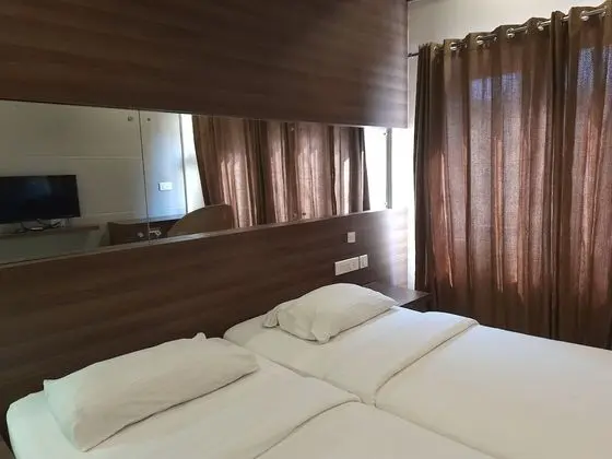 Deluxe Tek Büyük veya İki Ayrı Yataklı Oda