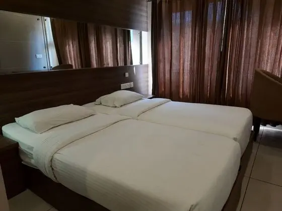 Deluxe Tek Büyük veya İki Ayrı Yataklı Oda