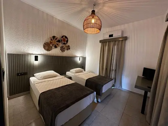 https://images.etstur.com/files/images/hotelImages/TR/53541/l/Paloma-Family-Club-Bitez-Oda-363356.jpg