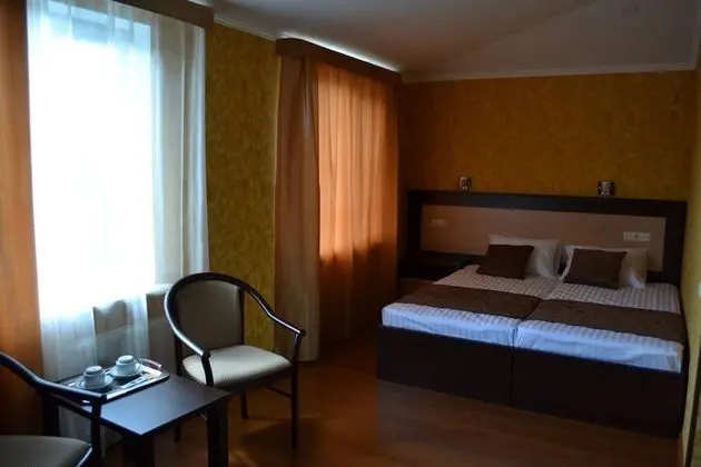 Comfort Tek Büyük veya İki Ayrı Yataklı Oda