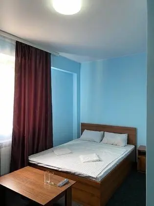 Basic Tek Büyük veya İki Ayrı Yataklı Oda