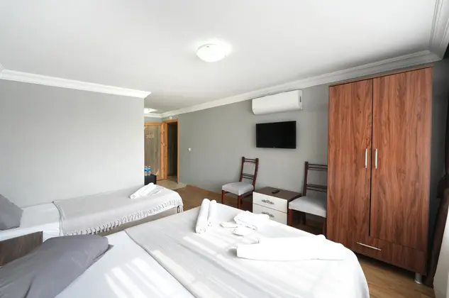 Deluxe Üç Kişilik Oda , Deniz ve Dağ Manzaralı