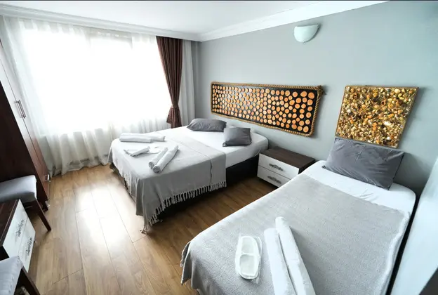 Deluxe Üç Kişilik Oda , Deniz ve Dağ Manzaralı