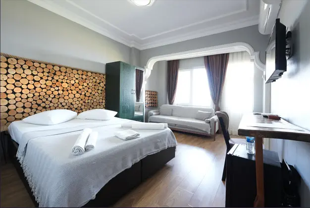 Deluxe Üç Kişilik Oda , Deniz ve Dağ Manzaralı