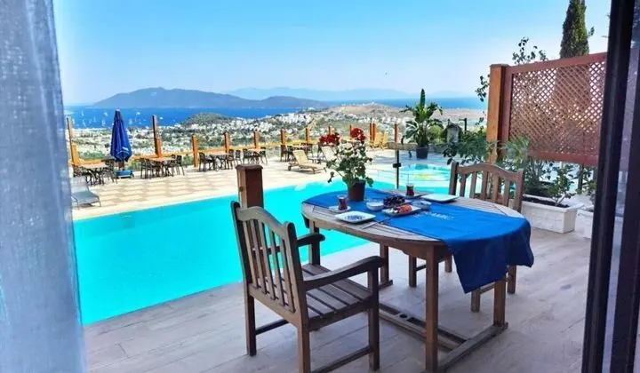 https://images.odamax.com/img/1024x768/odamax/image/upload/Panoramic_Residences_Bodrum_202605241512417_1_Halikarnasos_Balkon_6_.jpg