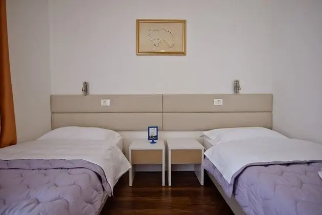 Basic Tek Büyük veya İki Ayrı Yataklı Oda