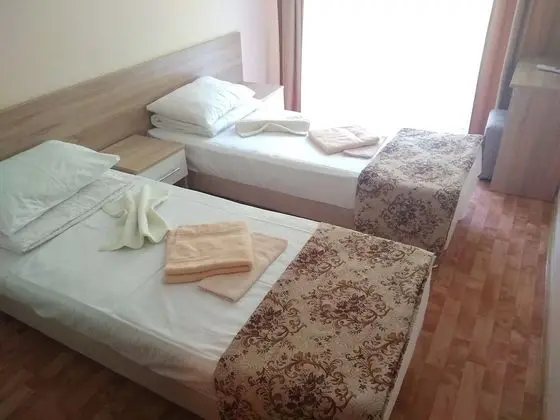 Family Tek Büyük veya İki Ayrı Yataklı Oda