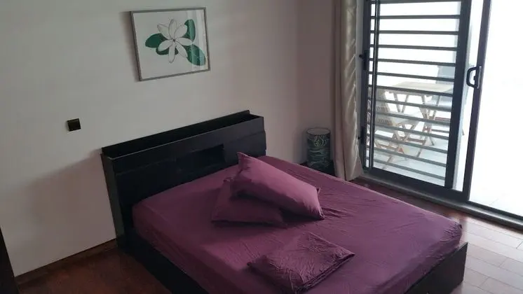 Economy Tek Büyük Yataklı Oda, Ortak Banyo, Bahçe Manzaralı (Tiare Room)