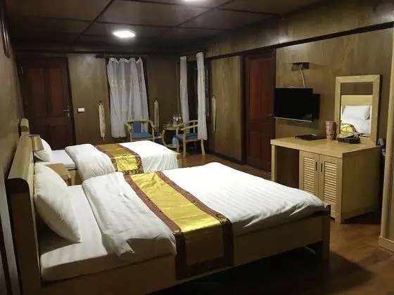 Standard Üç Kişilik Oda, Bahçe Manzaralı