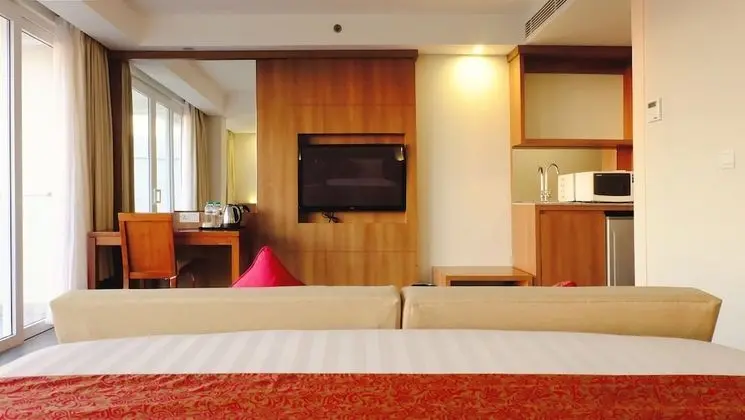 Junior Suite Balcony with Pool View