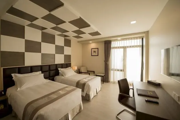 Deluxe Tek Büyük veya İki Ayrı Yataklı Oda