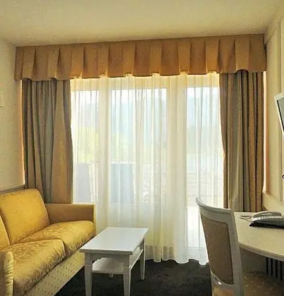 Deluxe Tek Büyük veya İki Ayrı Yataklı Oda