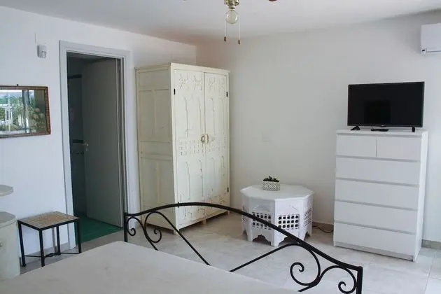 Deluxe Tek Büyük veya İki Ayrı Yataklı Oda, Birden Çok Yatak, Bahçe Manzaralı (Magnolia)