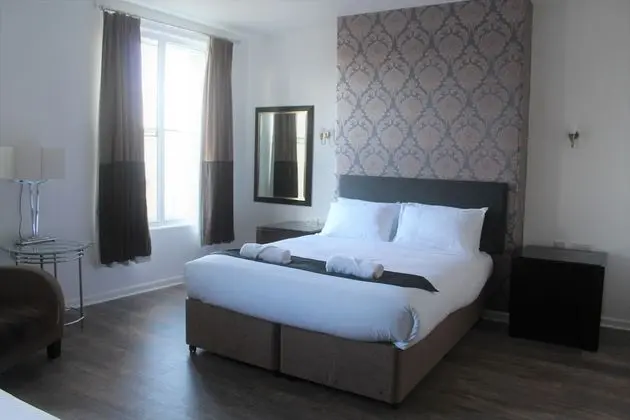 Deluxe Tek Büyük veya İki Ayrı Yataklı Oda