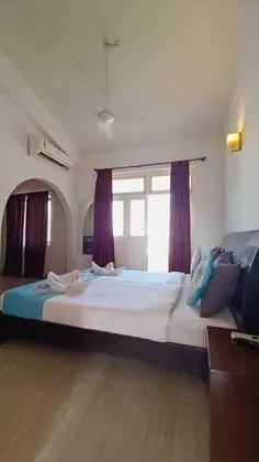 Deluxe Tek Büyük veya İki Ayrı Yataklı Oda