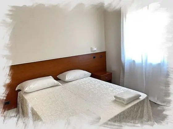 Basic Tek Büyük veya İki Ayrı Yataklı Oda