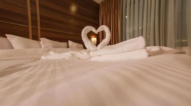 Deluxe Tek Büyük Yataklı Oda (2 Adults + 1 Child)