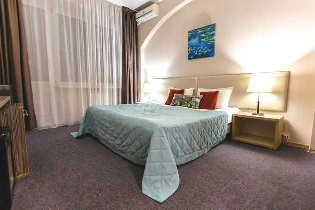 Deluxe Tek Büyük veya İki Ayrı Yataklı Oda