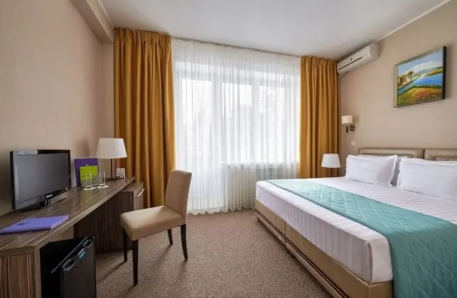 Deluxe Tek Büyük veya İki Ayrı Yataklı Oda