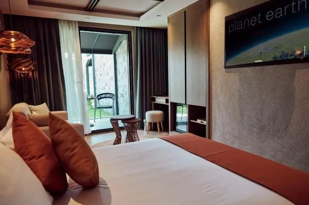 Deluxe Üç Kişilik Oda , Bahçe Manzaralı, Balkonlu