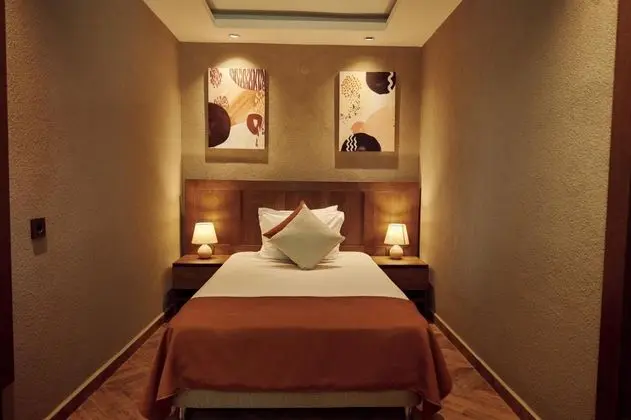 Deluxe Üç Kişilik Oda , Bahçe Manzaralı, Balkonlu