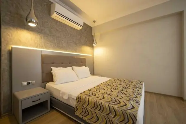 https://images.etstur.com/files/images/hotelImages/TR/68047/l/Pasa-Garden-Beach-Hotel-Oda-398106.jpg