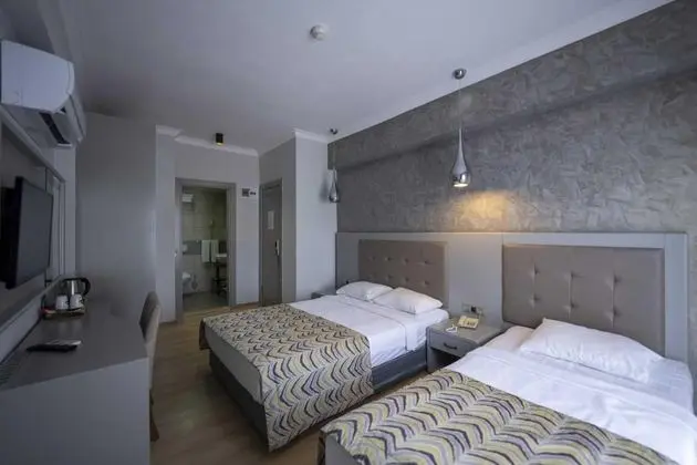 https://images.etstur.com/files/images/hotelImages/TR/68047/l/Pasa-Garden-Beach-Hotel-Oda-398108.jpg