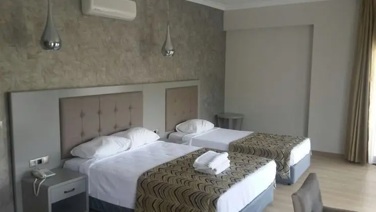 https://imagessl.etstur.com/files/images/hotelImages/TR/68047/l/Pasa-Garden-Beach-Club-Oda-98492.jpg