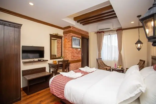 Deluxe Tek Büyük veya İki Ayrı Yataklı Oda