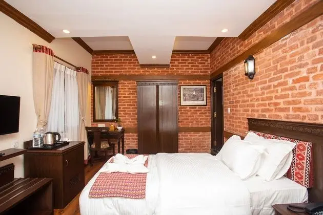 Deluxe Tek Büyük veya İki Ayrı Yataklı Oda