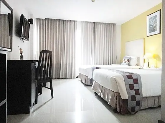 Deluxe Tek Büyük veya İki Ayrı Yataklı Oda