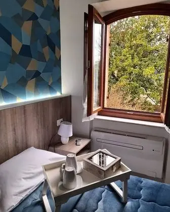 Comfort Tek Büyük Yataklı Oda