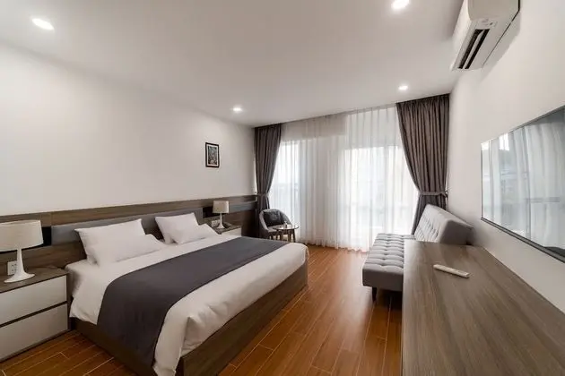 Deluxe Tek Büyük veya İki Ayrı Yataklı Oda
