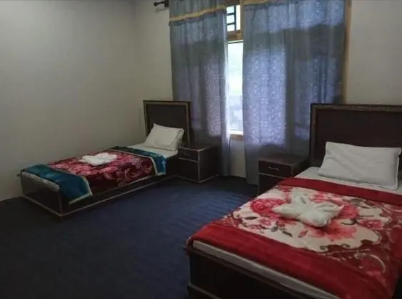 Deluxe Tek Büyük veya İki Ayrı Yataklı Oda