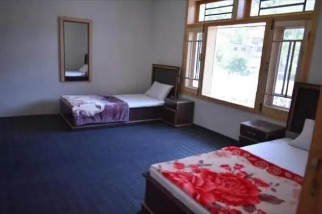 Deluxe Tek Büyük veya İki Ayrı Yataklı Oda