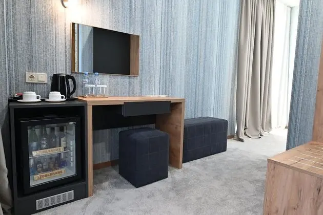 Deluxe Tek Büyük veya İki Ayrı Yataklı Oda
