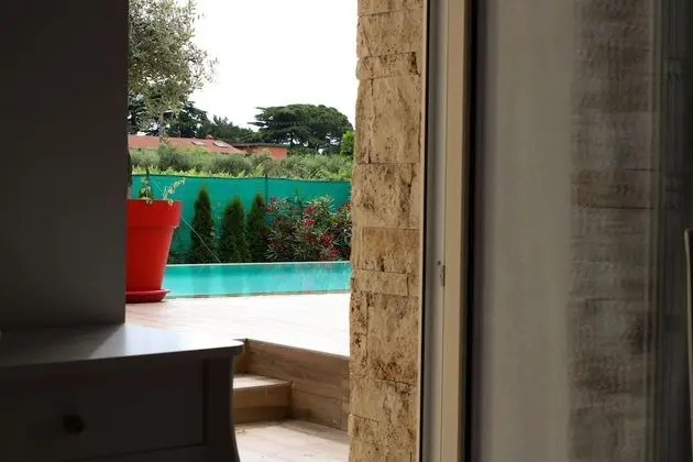 Deluxe Tek Büyük veya İki Ayrı Yataklı Oda, Havuz Manzaralı